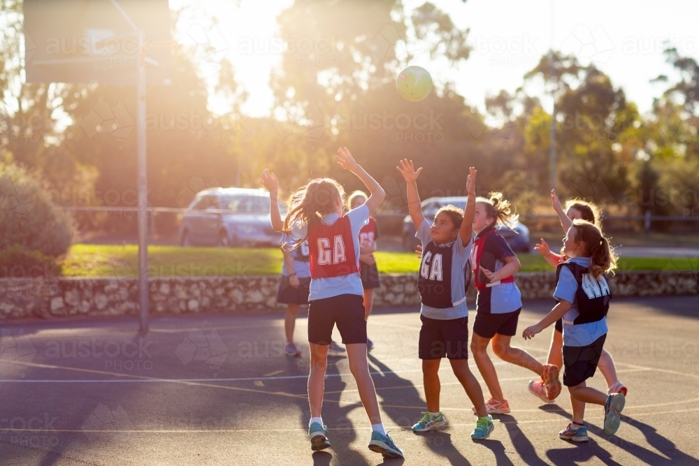 School children playing netball - Australian Stock Image