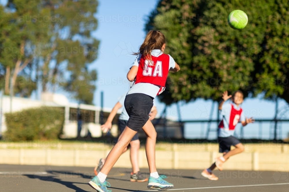 School girls playing netball - Australian Stock Image