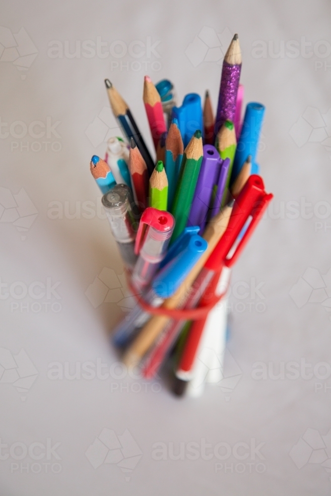 School stationery collected with a rubber band - Australian Stock Image