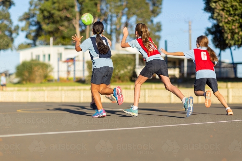 Schoolgirls playing netball - Australian Stock Image