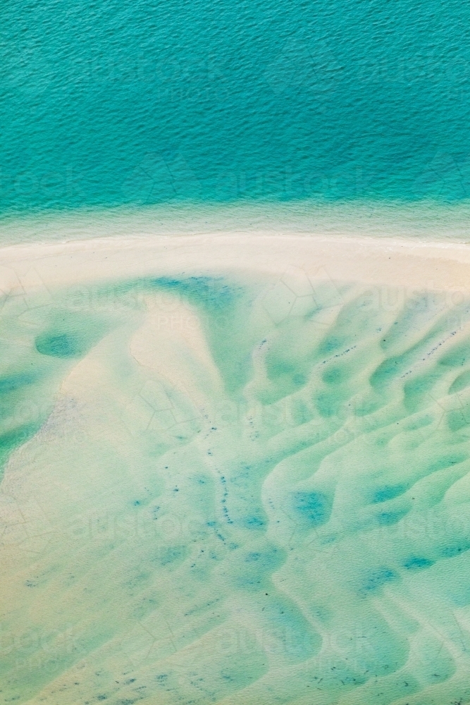 sea channels and shallows with sand ripples - Australian Stock Image