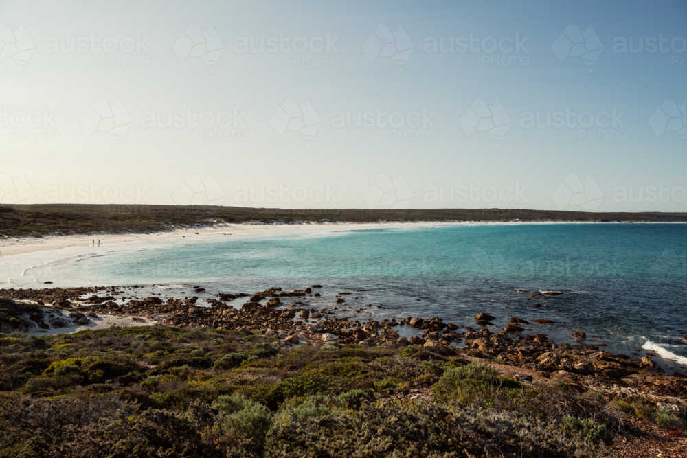 Seascape of long white sandy beach - Australian Stock Image