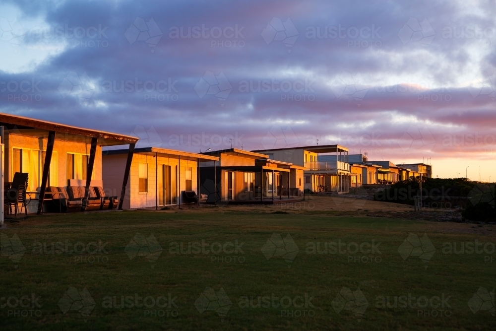 Seaside shacks at sunrise - Australian Stock Image