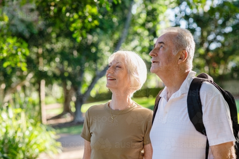 senior couple on nature walk - Australian Stock Image