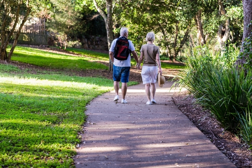 senior couple on nature walk - Australian Stock Image