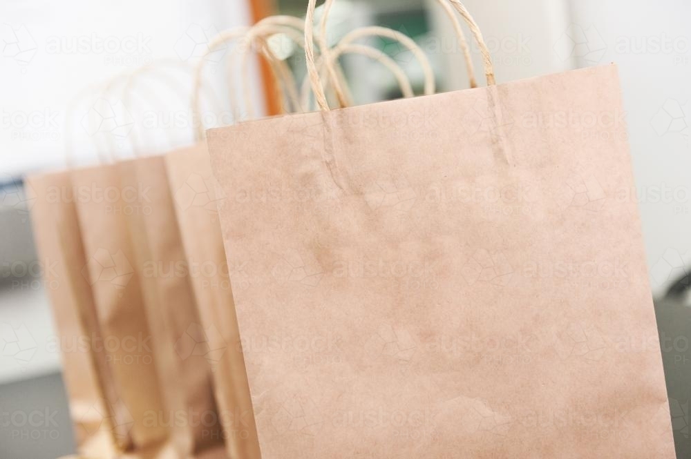 Shopping bags in plain brown paper - Australian Stock Image