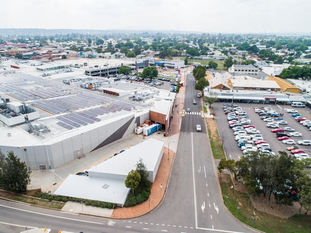 Shopping center with car park beside it in Singleton - Australian Stock Image