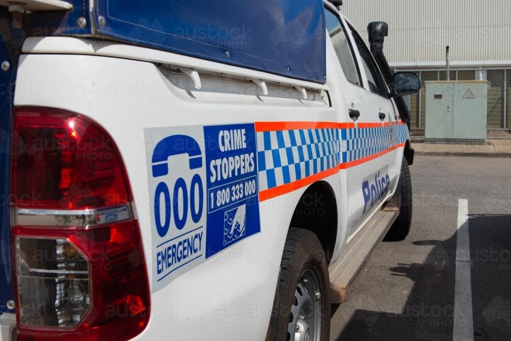 Side of police car - Australian Stock Image