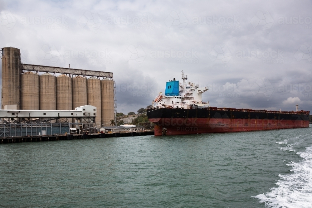 silos and wharf and other shipping infrastructure in Gladstone Harbour - Australian Stock Image