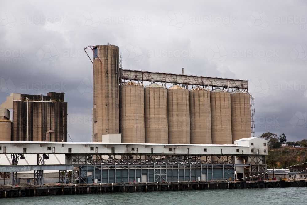 silos and wharf on Gladstone Harbour - Australian Stock Image