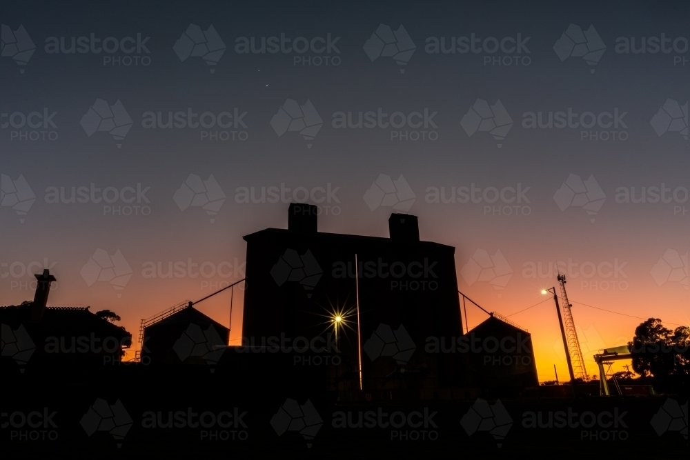 Silos at sunrise with dawn colours - Australian Stock Image