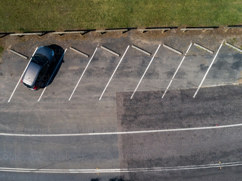 Single car parked in angled parking space seen from above - Australian Stock Image