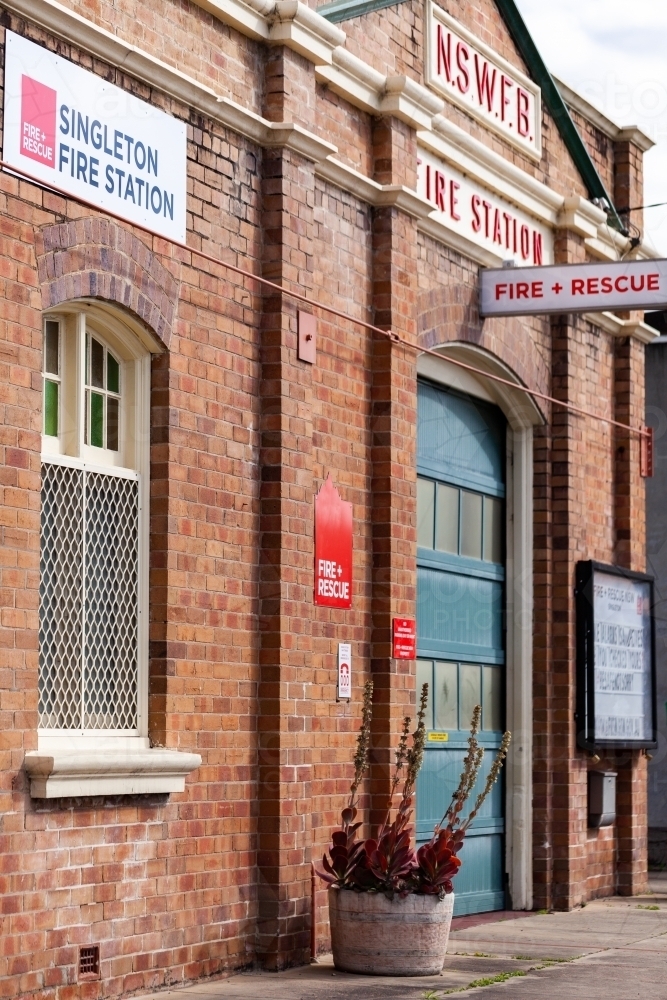 Image of Fire hose reel with cover in urban setting - Austockphoto