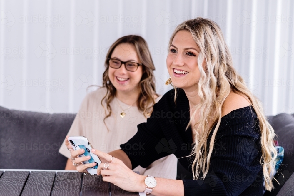 sisters hanging out together - Australian Stock Image