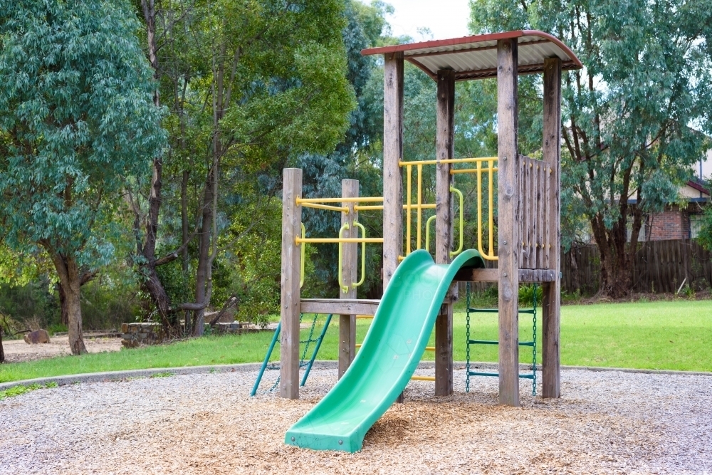 Slide in children playground - Australian Stock Image