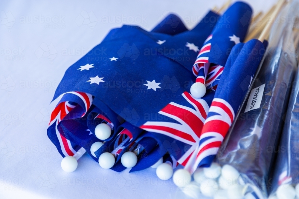 small australian flags on sticks at Australia day event - Australian Stock Image