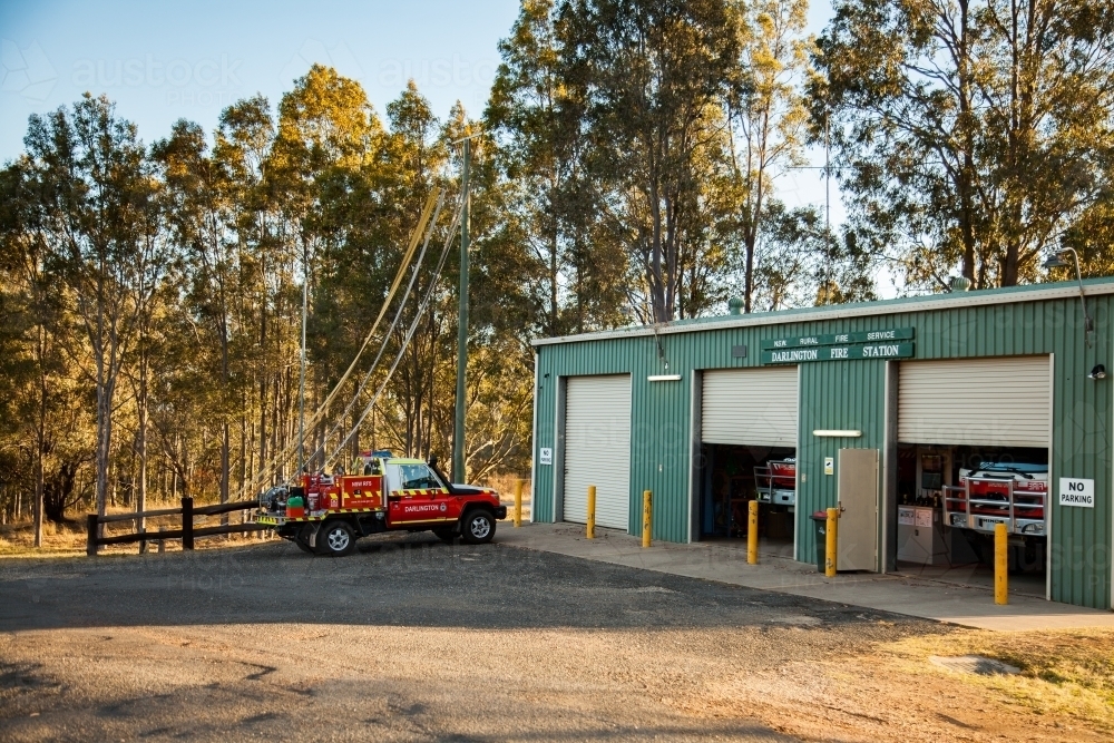 Small country fire truck parked at rural fire station ready for emergency - Australian Stock Image