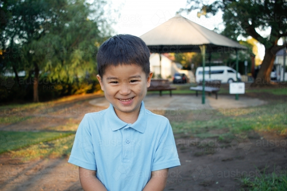 Smiling boy in school uniform - Australian Stock Image