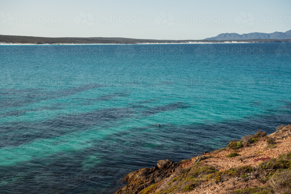 Snorkler enjoying the waters off Point Ann - Australian Stock Image