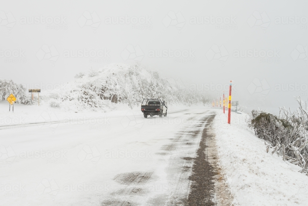 snow and ice on roads at top of Mt Hotham - Australian Stock Image