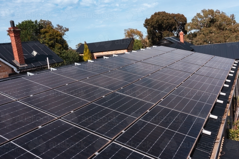 solar panels on a house roof - Australian Stock Image