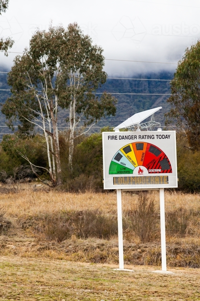 Solar powered fire danger rating sign - Australian Stock Image