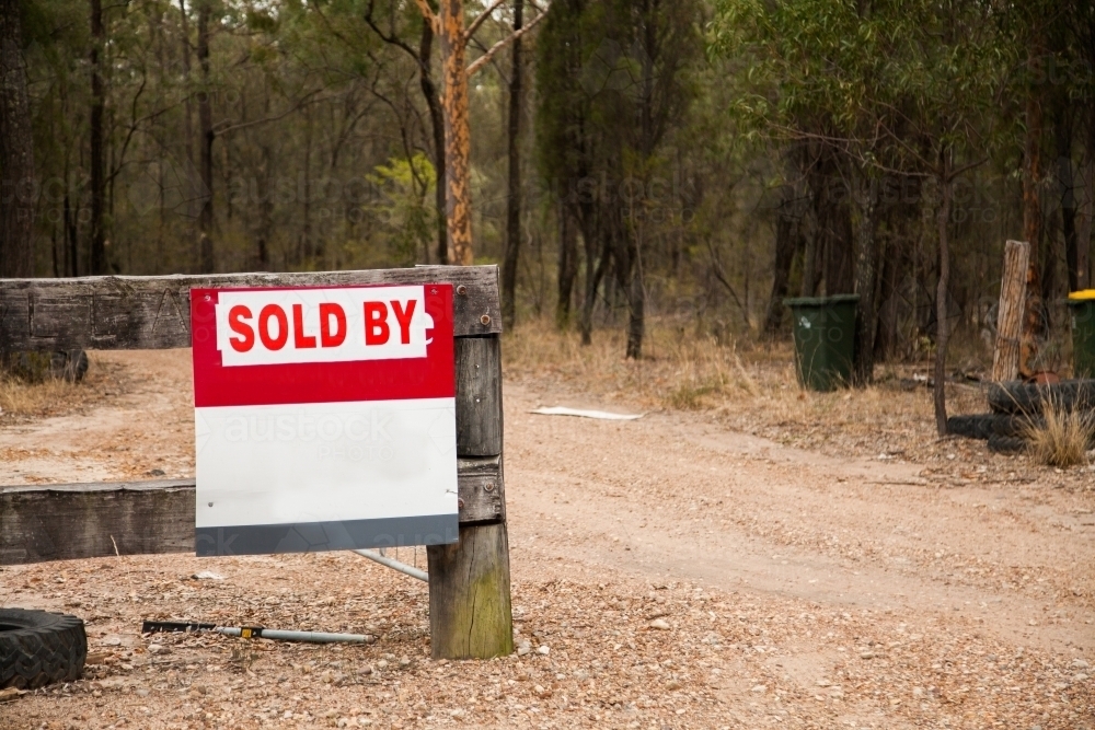 Sold buy sign on front gate of rural property - Australian Stock Image