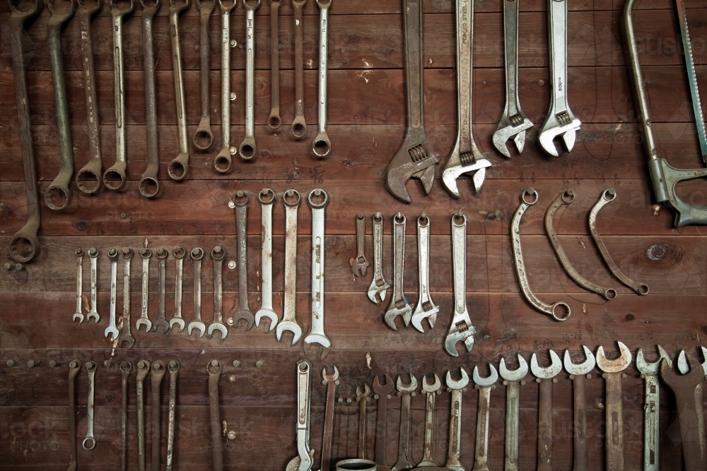 Spanners hanging on a tool board in a shed - Australian Stock Image