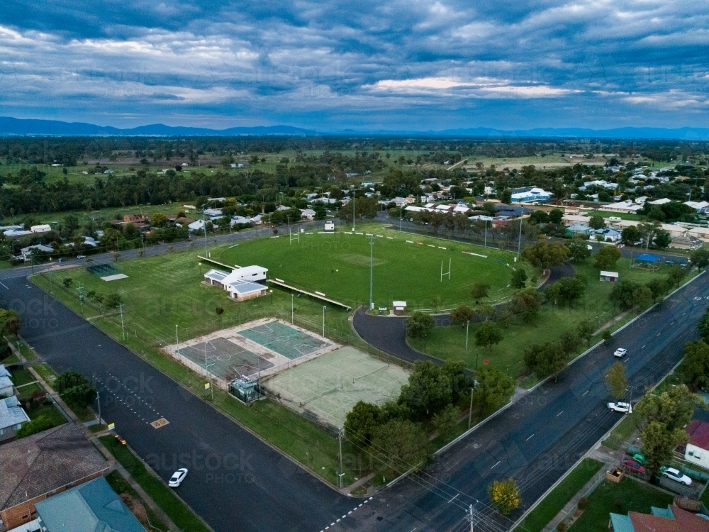 Sports oval playing field in Gunnedah from the air at dusk - Australian Stock Image