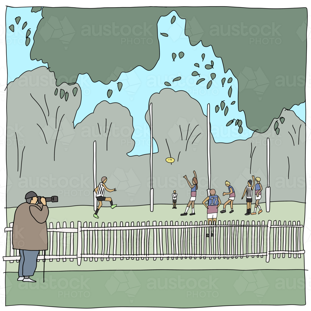 Square scene of photographer at AFL game in country town - Australian Stock Image