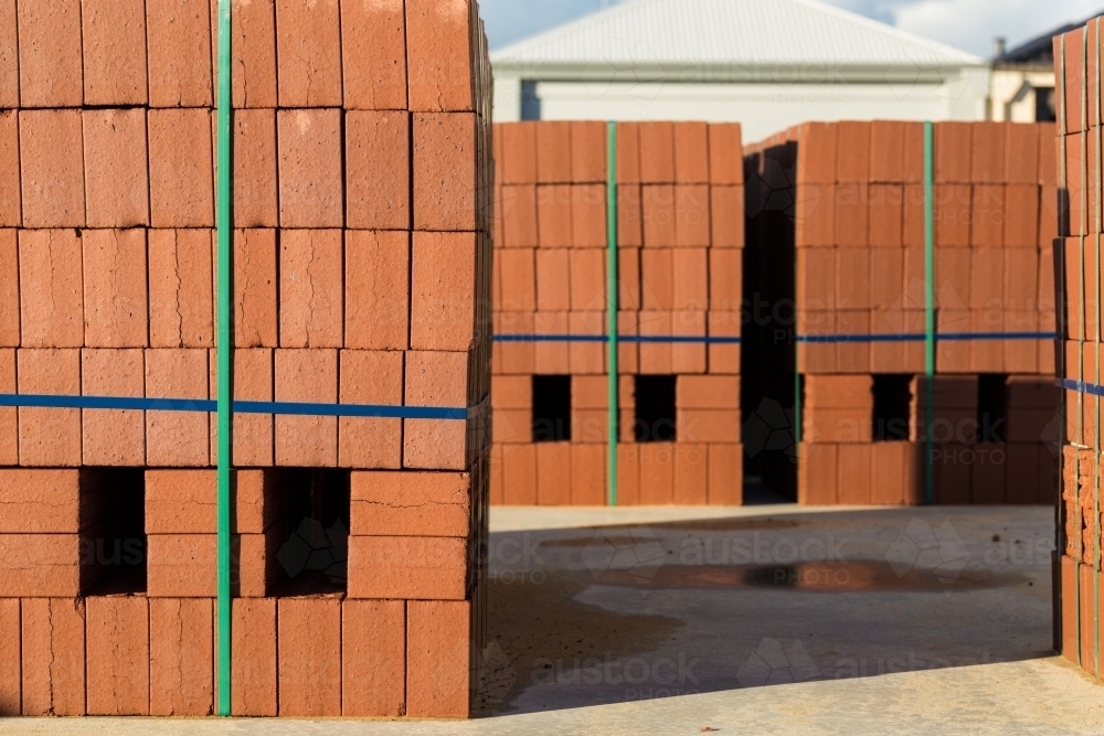 Stacks of bricks on building site - Australian Stock Image