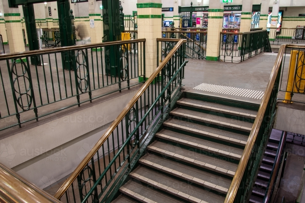 Stairs going down to platform in the historic St James Station in Sydney - Australian Stock Image