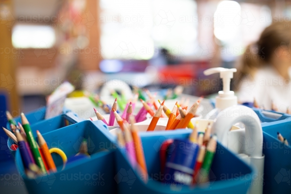 Stationary Pots in Classroom with coloured pencils - Australian Stock Image