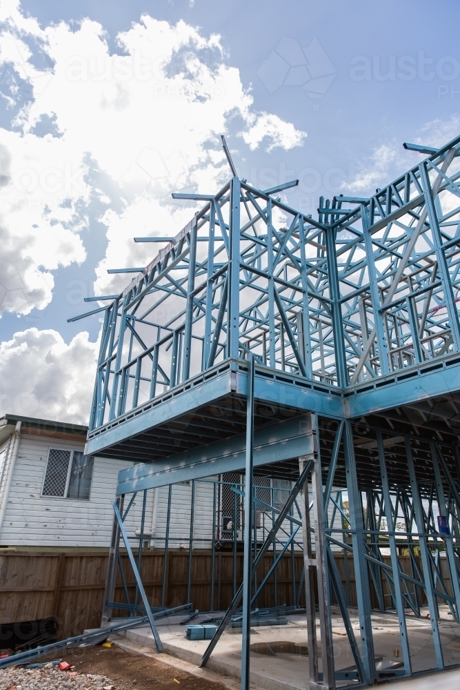 steel frame two storey house under construction - Australian Stock Image