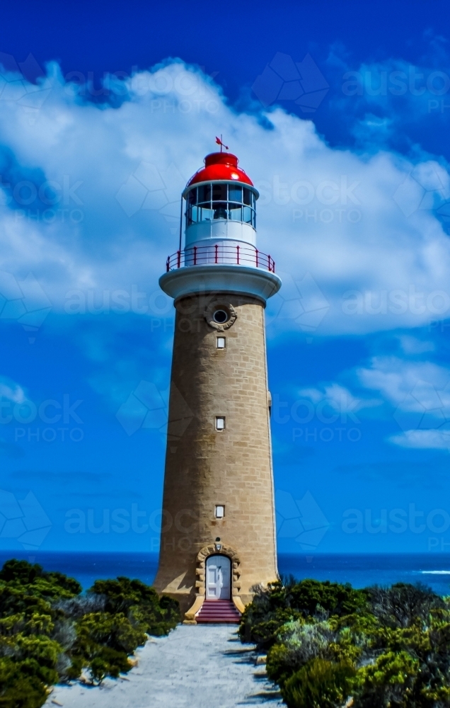 Stone lighthouse with red top - Australian Stock Image