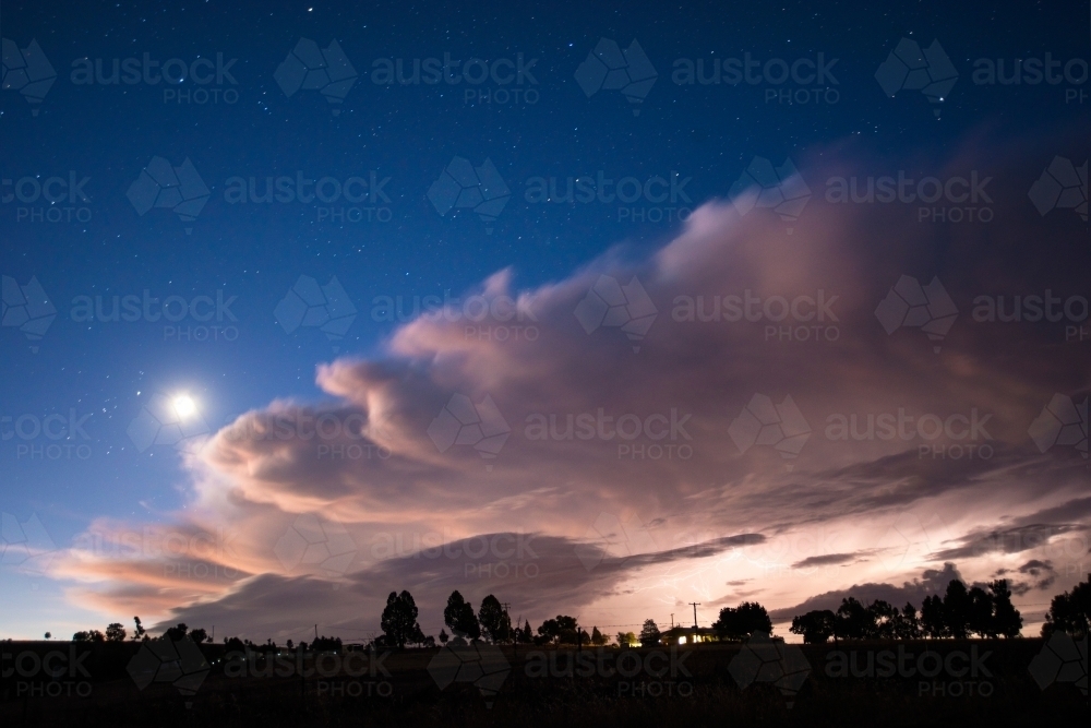 Storm approaching over the night sky. - Australian Stock Image