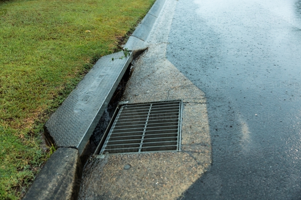 Image Of Storm Grate, Drain And Guttering - Austockphoto