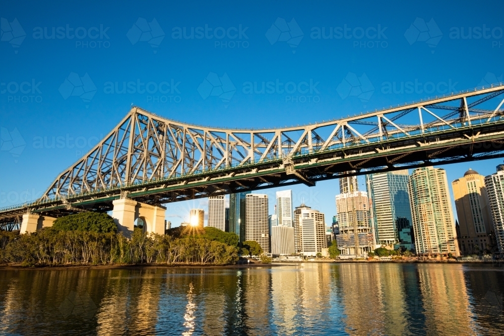 Story Bridge with Brisbane city in the background early in the morning - Australian Stock Image