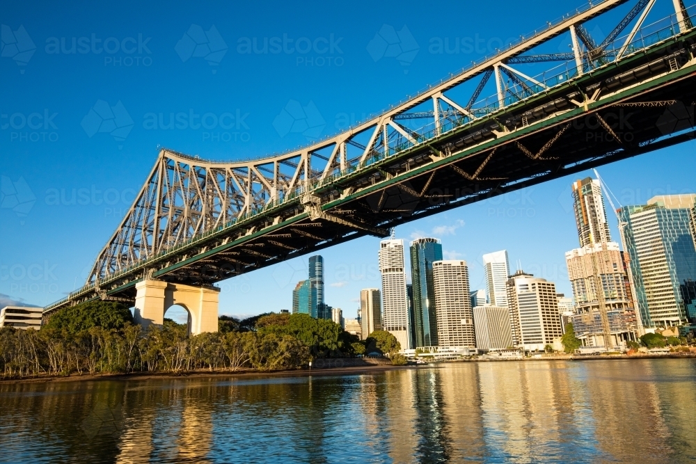 Story Bridge with Brisbane city in the background early in the morning - Australian Stock Image