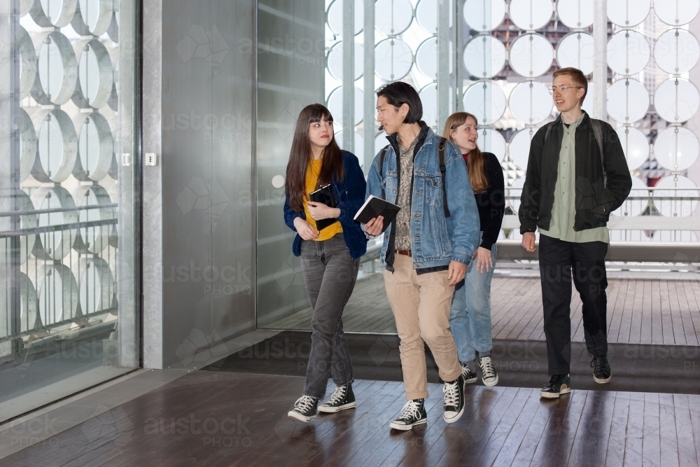 students walking through university building - Australian Stock Image