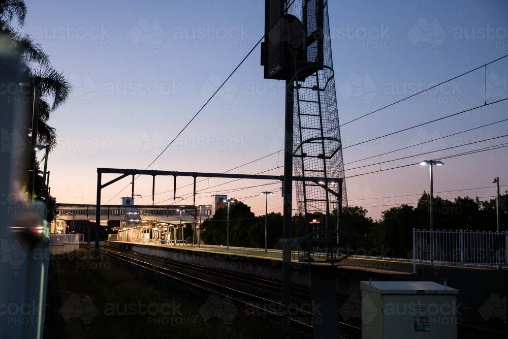 suburban Brisbane train station at dusk - Australian Stock Image