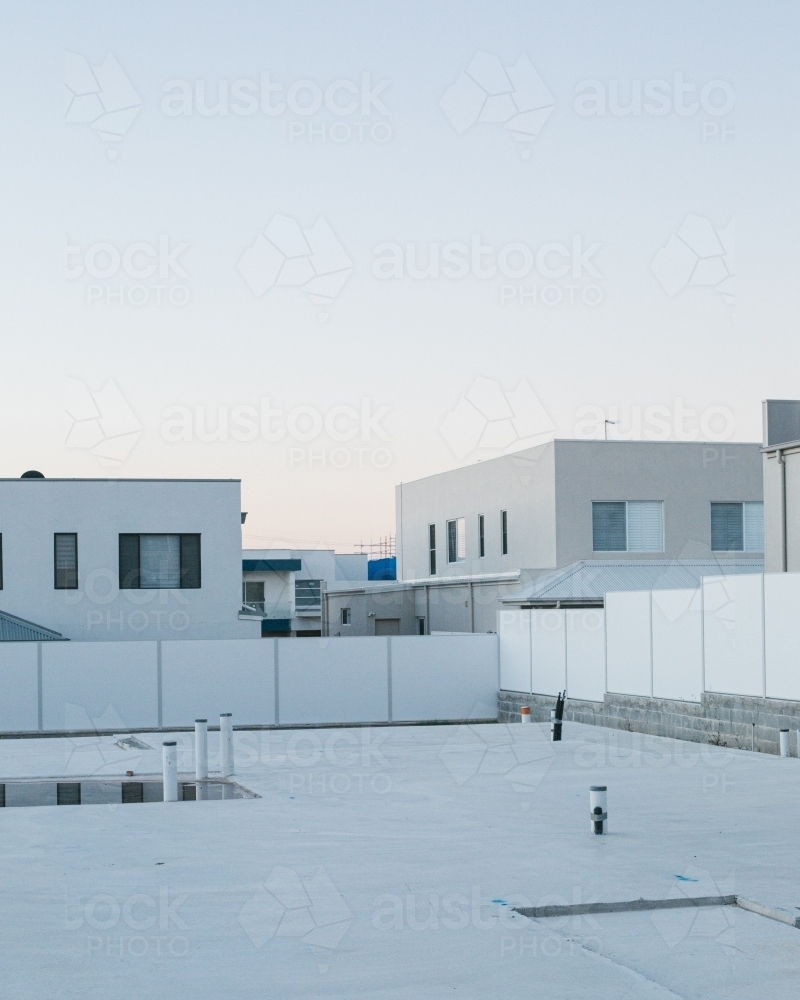 Suburban housing construction site and building foundations, evening light - Australian Stock Image