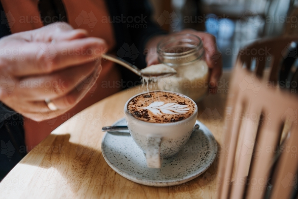 Sugar in coffee - Australian Stock Image