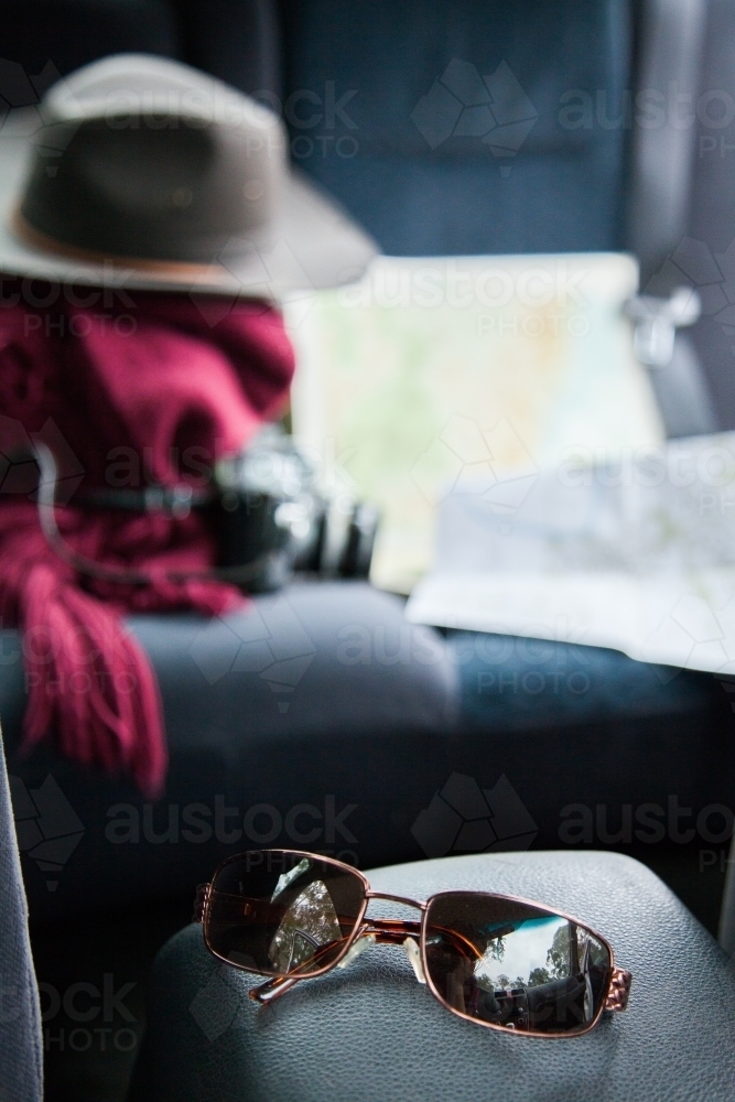 Sunnies and blanket and hat in the back of a car - Australian Stock Image