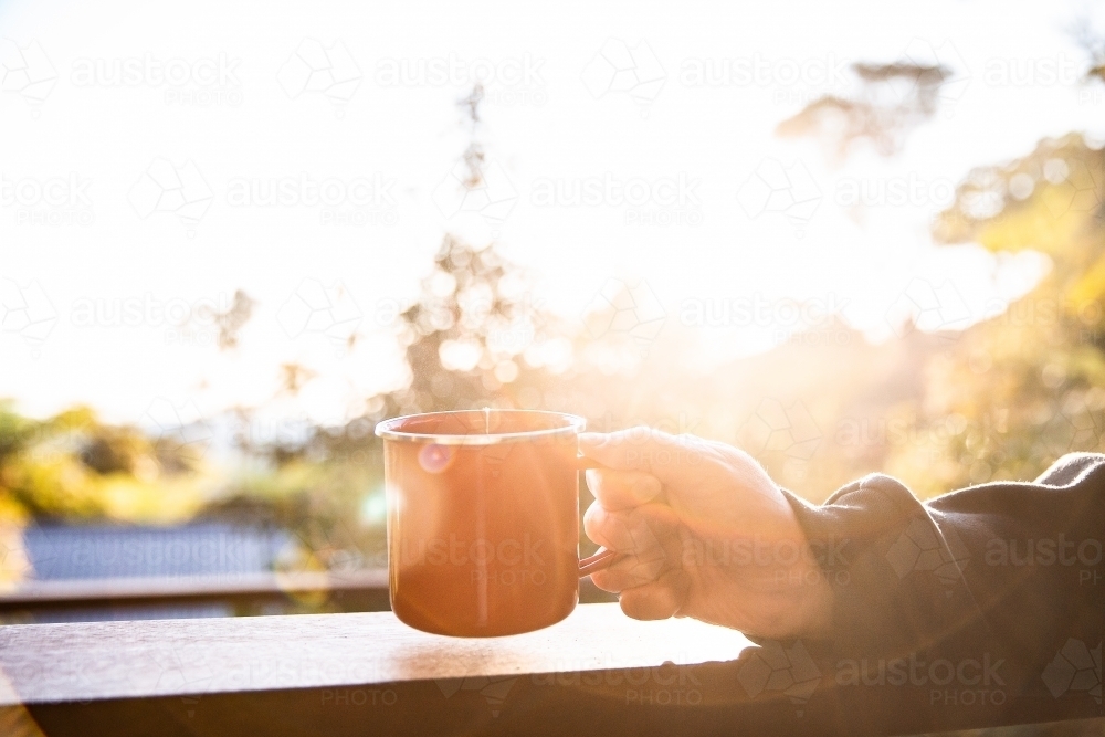 sunrise in a mug - Australian Stock Image