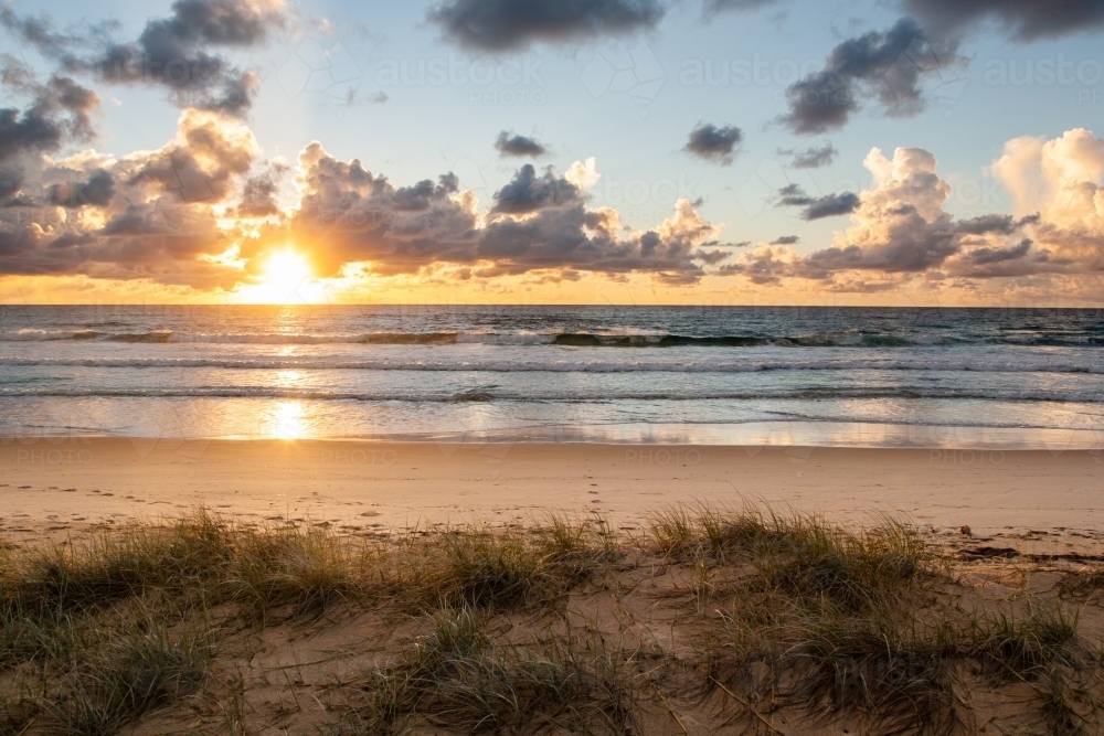 Sunrise on the eastern beach of Moreton Island - Australian Stock Image