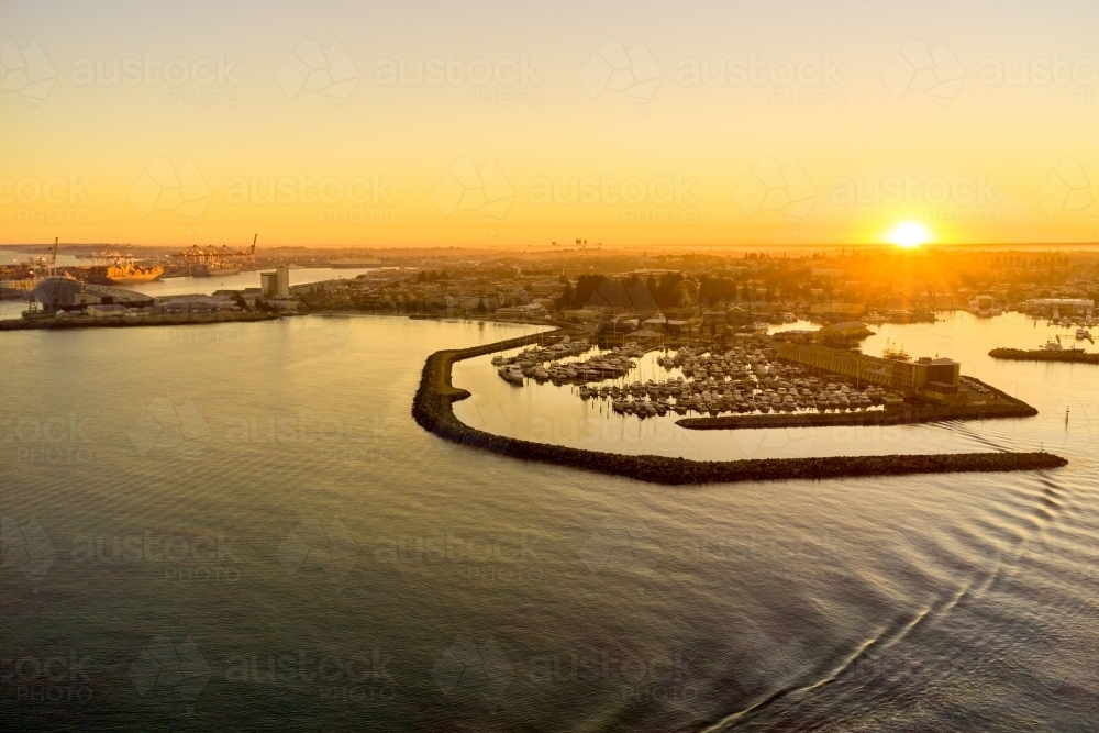 Sunrise over Fremantle's challenger harbour and marina in Western Australia. - Australian Stock Image