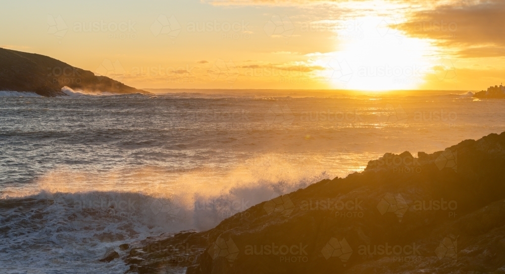 sunrise over mutton-bird island - Australian Stock Image