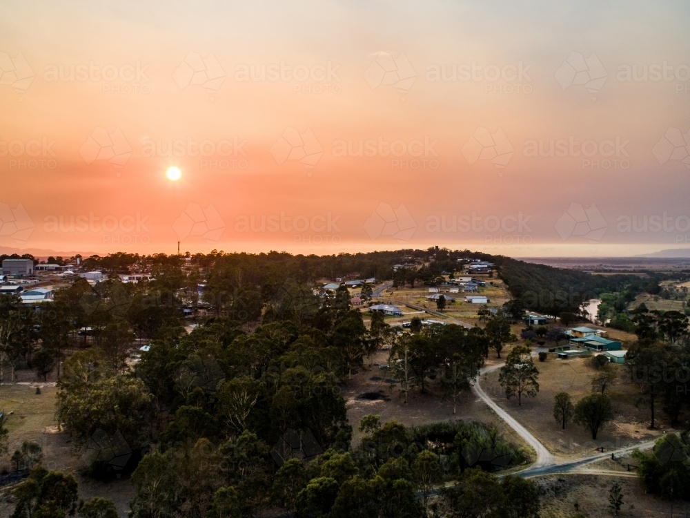 Sunrise through bushfire smoke haze - Australian Stock Image