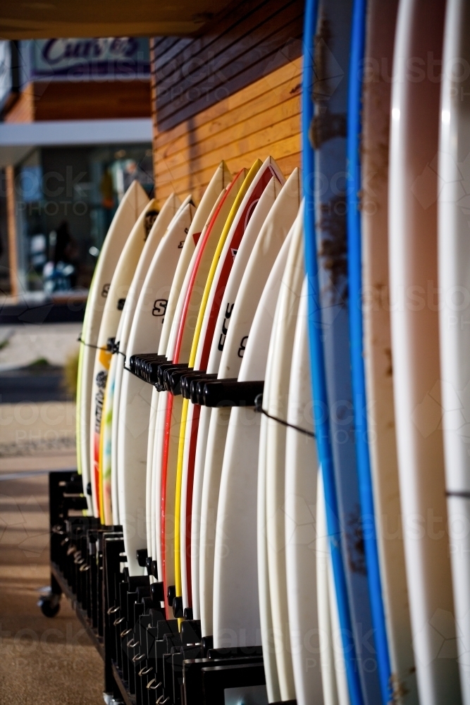 Surfboards lined up outside a surf shop - Australian Stock Image